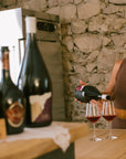 You can relax with an aperitif in a historic building with two glasses of wine, paired with local Trentino specialties such as Speck and Trentingrana cheese.