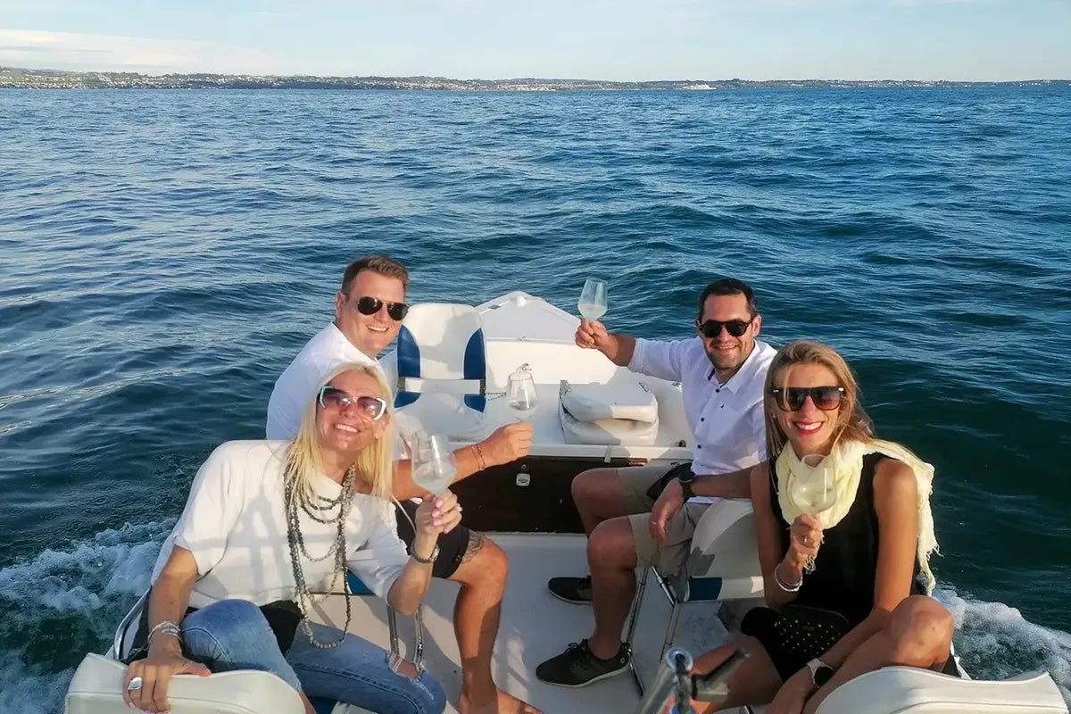 Private boat tour with wine and fish aperitif from Garda - Boat Tour - Touraround